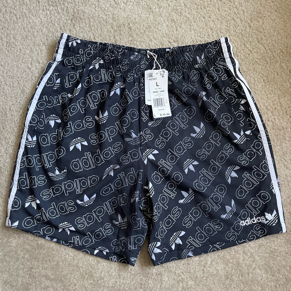 Adidas logo swim shorts. Men size large. **brand new**